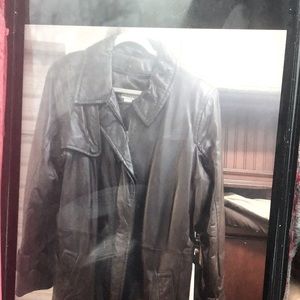 Women’s stylish lamb skin leather jacket. Slightly used with zip out lining